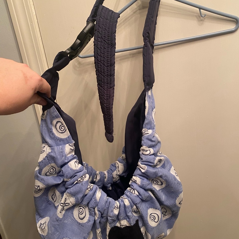 Reversible sling carrier